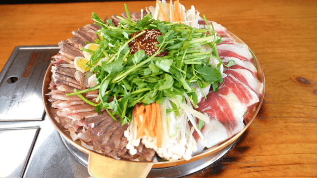 Korean-style platter of fresh vegetables and meat