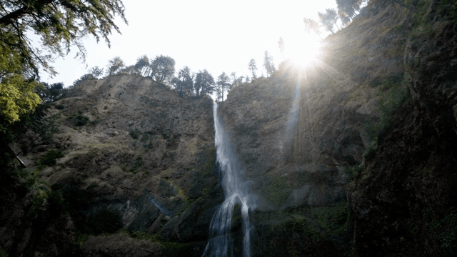 A waterfall cascading down a rocky cliff