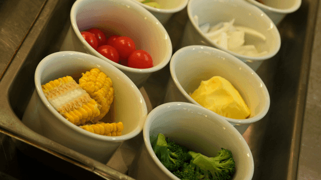 Bowls containing various vegetable ingredients