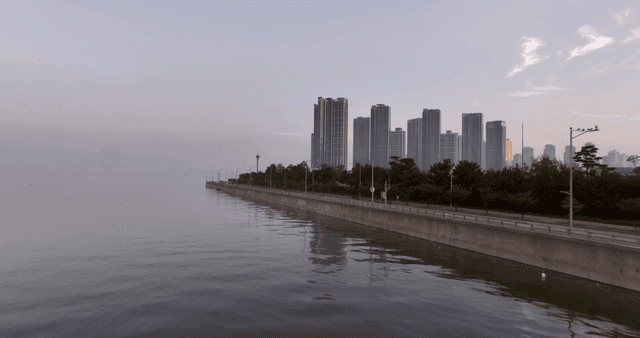 Serene coastal cityscape at dawn
