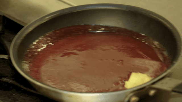 Butter melting in a pan with sauce