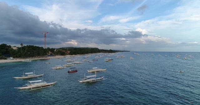 Bangcas Floating on Tropical Beach Sea