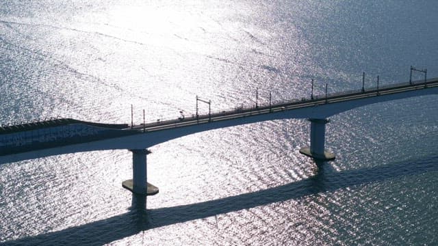 Bridge over a shimmering sea
