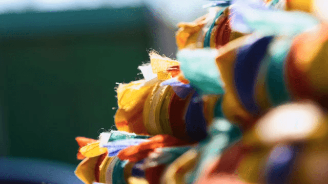 Pile of ritual items wrapped in five-colored cloth