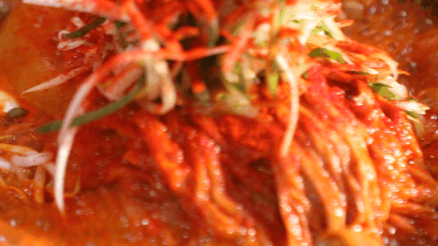 Aged kimchi pork rib stew boiling in pot