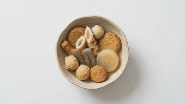 Bowl of various oden placed on white background