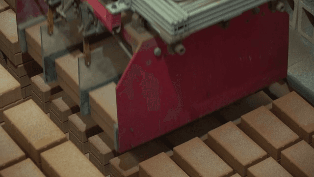 Stacks of bricks in a factory setting