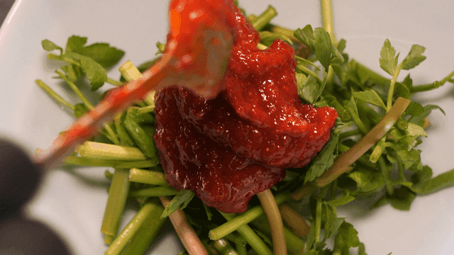 Fresh greens with red chili paste