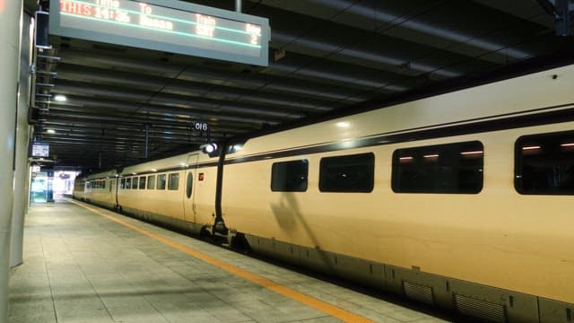 Train Leaving Platform with Destination Information