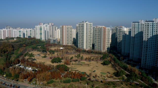 Wide Urban Park Amidst High-Rises