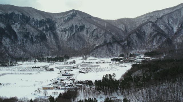 Snow-Covered Mountain Village in Winter