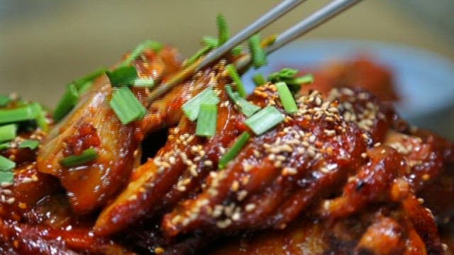 Seasoned pig's feet picked up with chopsticks