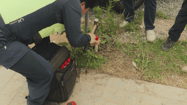 Workers marking a construction site