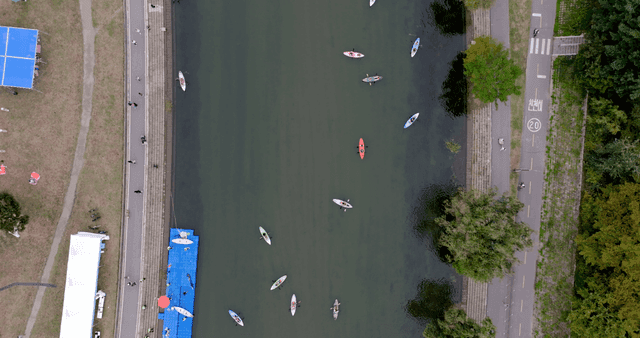 Kayakers paddling on a calm river