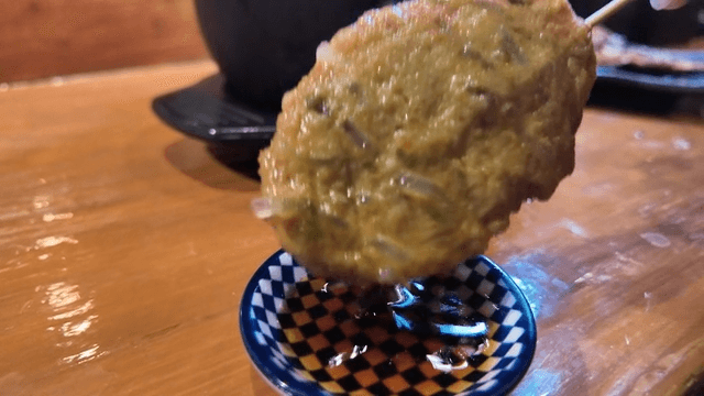 Fish cake skewers in soup