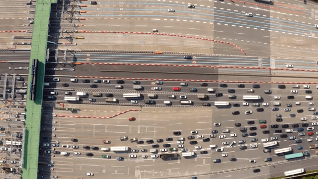Busy highway with multiple lanes and vehicles