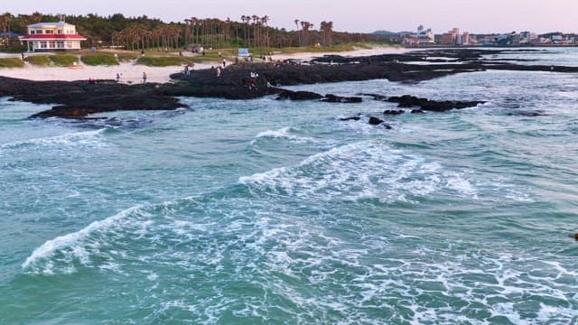 Scenic beach with waves and rocks