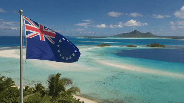 Cook Islands flag fluttering over tropical island