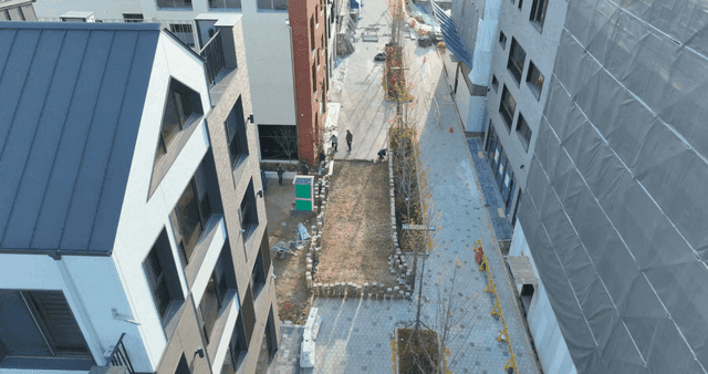 Street sidewalk block construction site with workers