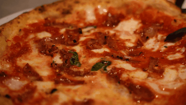 Freshly baked oven-baked pizza with toppings