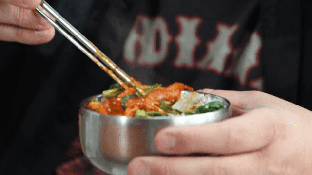 Bowl of rice with vegetables and grilled burdock root