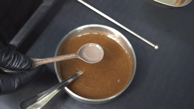 Sauce mixed in metal bowl