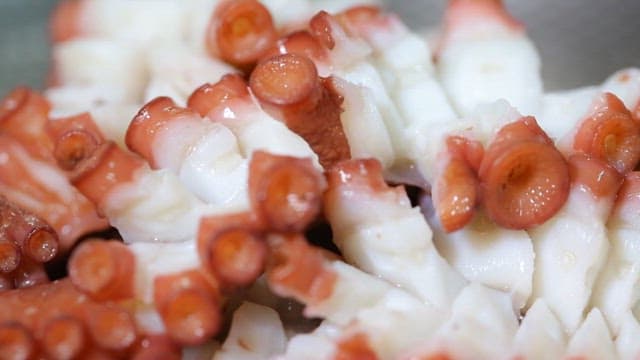 Close-up of sliced parboiled octopus pieces