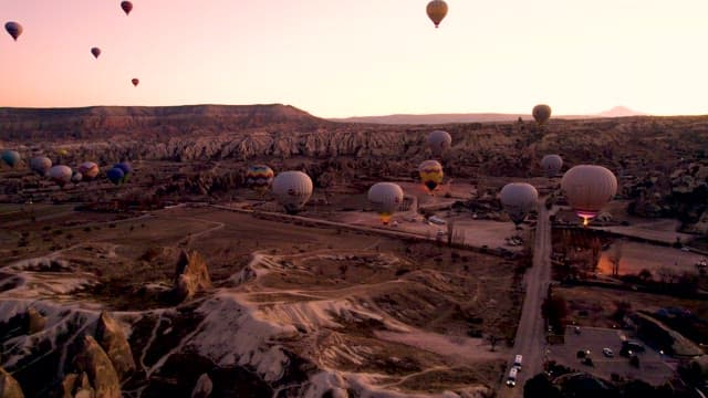 Hot Air Balloons Over the Sky at Dusk