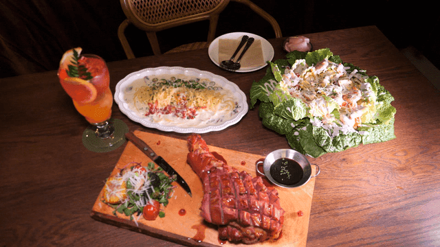 Table with variety of Western dishes and drinks