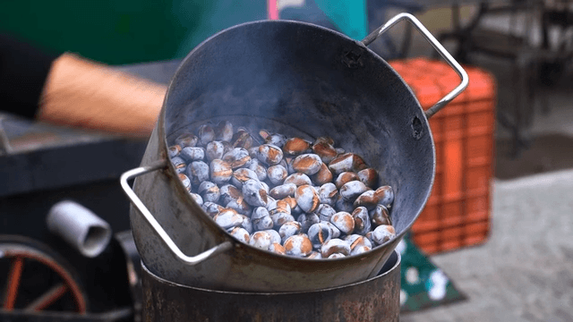 Roasting chestnuts in a large pot