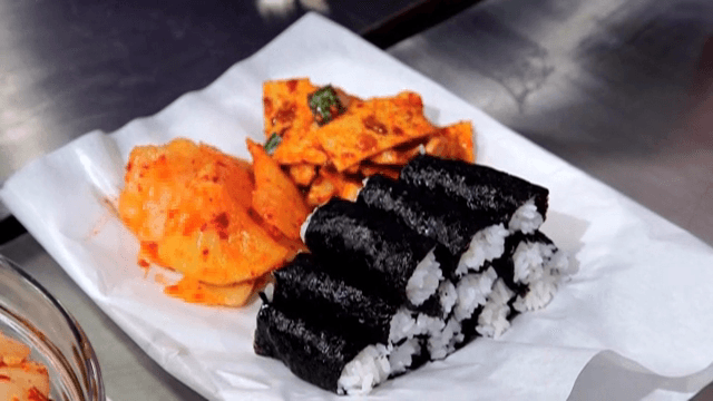 Gimbap and Kimchi on a plate