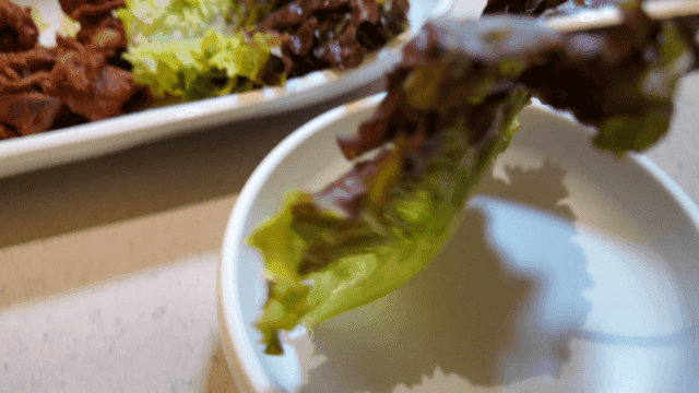 Korean stir-fried spicy pork with fresh lettuce