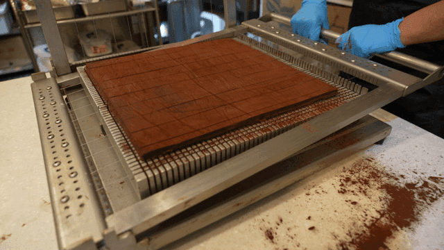 Cutting chocolate dessert with precision