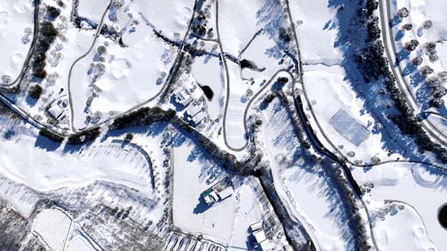 Snow-covered Landscape with Mountains and Trees