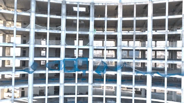 Unfinished building near the mountain