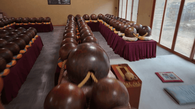 Giant prayer beads filling temple hall