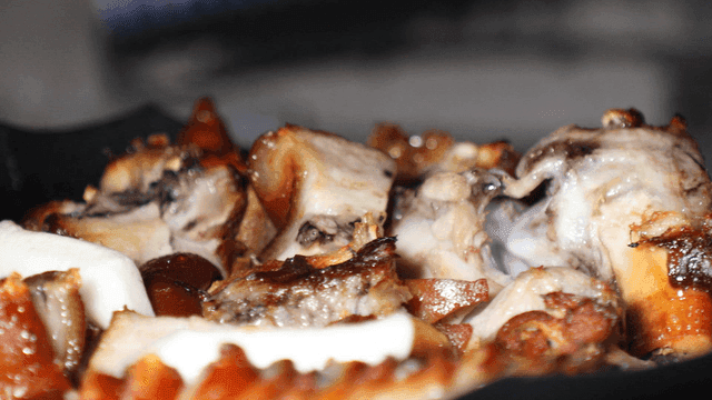 Pig's trotters on hot iron plate