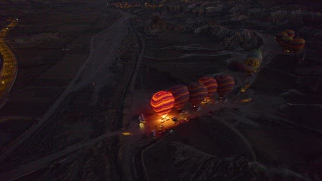 Colorful Patterned Hot Air Balloons Lined up Side by Side