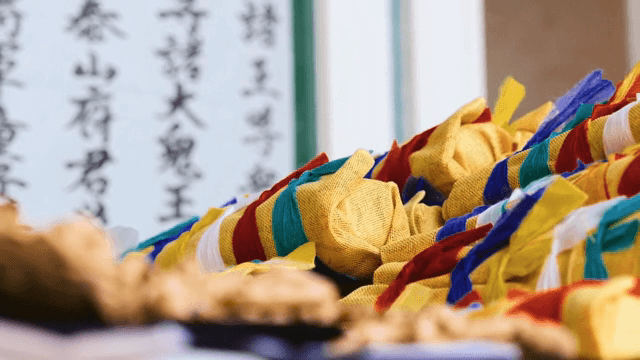 Pile of ritual items wrapped in five-colored cloth