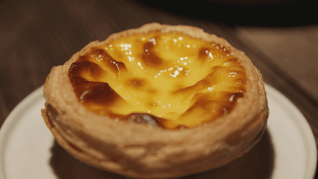 Delicious egg tart on plate.