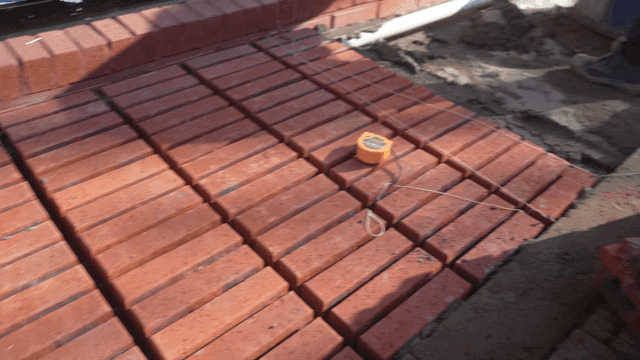 Bricklayers at construction site