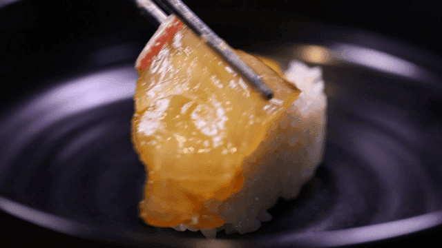 Sushi with wasabi being prepared