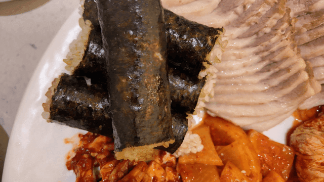 Plate of Korean dishes with side dishes