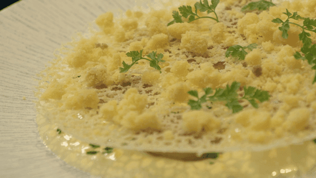 Gnocchi garnished with herbs and crumbs