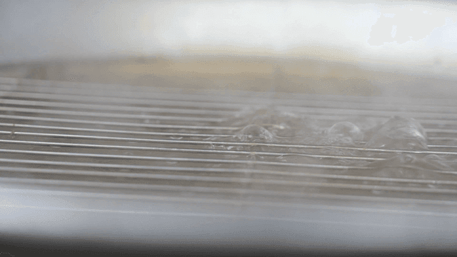 Boiling water in a metal pot