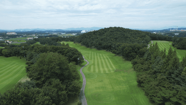 Aerial view of a lush green golf course
