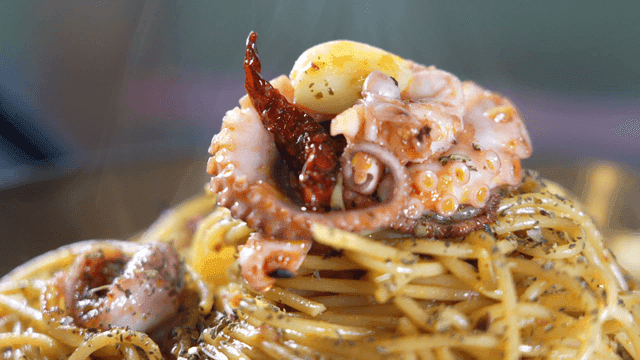 Octopus pasta with herbs and spices
