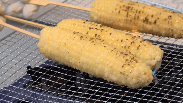 Grilled on gas burner corn skewers