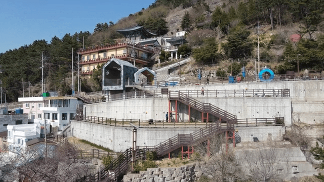 Hillside village area with pathways