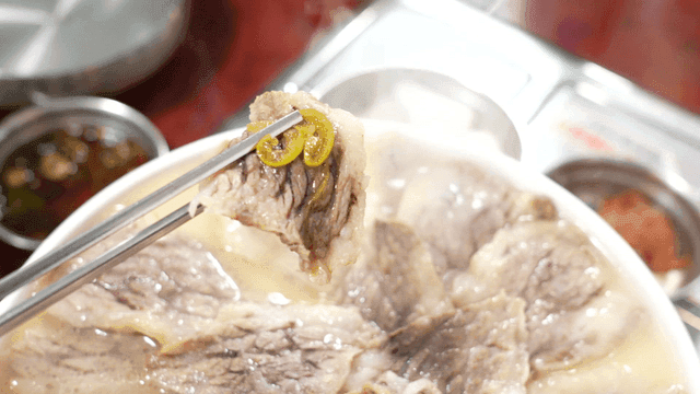 Tender boiled beef with chopsticks